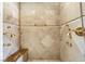 Spacious shower with multiple shower heads and a built-in bench at 3495 Pama Ln, Las Vegas, NV 89120