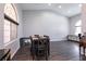 Dining room features hardwood floors and a large window at 3817 W Red Coach Ave, North Las Vegas, NV 89031