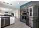 Sleek kitchen with stainless steel appliances and modern cabinetry at 3817 W Red Coach Ave, North Las Vegas, NV 89031