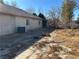 Large backyard with gravel and sparse vegetation at 3941 Dennis St, Pahrump, NV 89060