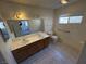 Bathroom with double vanity and shower at 3941 Dennis St, Pahrump, NV 89060