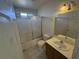 Bathroom with tub, toilet and vanity at 3941 Dennis St, Pahrump, NV 89060