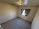 Bright bedroom with carpeted floor and window at 3941 Dennis St, Pahrump, NV 89060