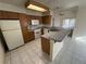 Kitchen with island and ample cabinetry at 3941 Dennis St, Pahrump, NV 89060