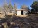 Detached storage shed in backyard at 3941 Dennis St, Pahrump, NV 89060