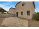 Two-story home with a flagstone patio and a block wall at 3968 Moon Tango St, Las Vegas, NV 89129