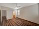 Bedroom with wood-look floors and en-suite bathroom access at 3968 Moon Tango St, Las Vegas, NV 89129