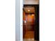 Private home elevator with wood paneling at 4 Bloomfield Hills Dr, Henderson, NV 89052