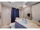 Clean bathroom, featuring a vanity with a marble top and shower at 4008 Snead Dr, Las Vegas, NV 89107