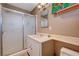 Cozy bathroom featuring shower with sliding doors, sink with vanity, mirror, and toilet at 4008 Snead Dr, Las Vegas, NV 89107