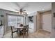 Cozy kitchen dining area next to laundry area with an overhead fan, and tile flooring at 4008 Snead Dr, Las Vegas, NV 89107