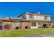 Attractive two-story home featuring brick accents, solar panels, and a well-kept lawn, showcasing curb appeal and energy efficiency at 4008 Snead Dr, Las Vegas, NV 89107