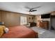 A spacious carpeted main bedroom features a ceiling fan and large closet at 4008 Snead Dr, Las Vegas, NV 89107