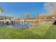 Circular pool with safety fence in backyard at 4008 Snead Dr, Las Vegas, NV 89107