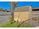 Backyard storage shed with a small garden area at 4008 Snead Dr, Las Vegas, NV 89107