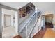 Staircase with gray carpeting and white railings at 4008 Snead Dr, Las Vegas, NV 89107