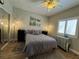 Bedroom with mirrored closet and window shutters at 420 Rhythm St, Henderson, NV 89074