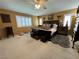 Spacious main bedroom with king-size bed and plantation shutters at 420 Rhythm St, Henderson, NV 89074