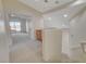 Carpeted hallway with staircase leading to a bedroom with sliding glass doors at 422 Waterbrook Dr, Henderson, NV 89015