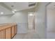 Hallway with carpet, built-in storage, and neutral walls provides access to various rooms in the home at 422 Waterbrook Dr, Henderson, NV 89015