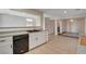 Well-lit kitchen with stainless steel dishwasher and granite countertops at 422 Waterbrook Dr, Henderson, NV 89015