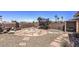 Large backyard with patio, trampoline, and storage shed at 427 Shamrock Dr, Henderson, NV 89002