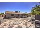 Backyard view showing patio, screened enclosure, and house at 427 Shamrock Dr, Henderson, NV 89002