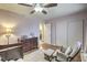 Serene bedroom with rocking chair and dresser at 427 Shamrock Dr, Henderson, NV 89002