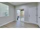 Dining area with sliding door to backyard and hardwood floor at 4530 Lime Straight Dr, Las Vegas, NV 89115