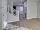 Light and airy entryway with stairs and wood-look floors at 4530 Lime Straight Dr, Las Vegas, NV 89115