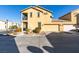 Two-story house with attached garage and landscaping at 4530 Lime Straight Dr, Las Vegas, NV 89115