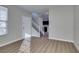 Light-filled living room with stairs and hardwood floors at 4530 Lime Straight Dr, Las Vegas, NV 89115