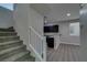 Modern staircase with white railing leading upstairs at 4530 Lime Straight Dr, Las Vegas, NV 89115