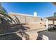 Landscaped backyard with patio and sitting area at 5417 Lemhi Ct, North Las Vegas, NV 89031