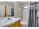 Clean bathroom with a tub, shower, and vanity at 5417 Lemhi Ct, North Las Vegas, NV 89031