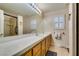 Double vanity bathroom with a walk-in shower at 5417 Lemhi Ct, North Las Vegas, NV 89031