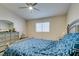 Relaxing bedroom with a queen bed and ceiling fan at 5417 Lemhi Ct, North Las Vegas, NV 89031