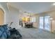 Kitchen and dining area with breakfast bar and table for four at 5417 Lemhi Ct, North Las Vegas, NV 89031