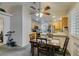 Bright dining area with four chairs and kitchen access at 5417 Lemhi Ct, North Las Vegas, NV 89031