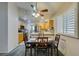 Bright dining area with four chairs and kitchen access at 5417 Lemhi Ct, North Las Vegas, NV 89031