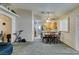 Kitchen and dining area with breakfast bar and table for four at 5417 Lemhi Ct, North Las Vegas, NV 89031