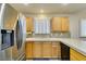 Modern kitchen with stainless steel appliances and an island at 5417 Lemhi Ct, North Las Vegas, NV 89031