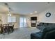 Living room featuring a fireplace, recessed lighting, and comfortable sofas at 5417 Lemhi Ct, North Las Vegas, NV 89031