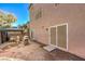 Backyard showing covered patio and exterior of home at 5490 Tulip Hill Ave, Las Vegas, NV 89141
