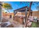 Cozy backyard featuring a hot tub under a gazebo surrounded by a brick wall at 5490 Tulip Hill Ave, Las Vegas, NV 89141