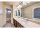 Double vanity bathroom with a view of another room at 5490 Tulip Hill Ave, Las Vegas, NV 89141