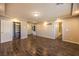 Open bedroom featuring wood floors, recessed lighting, and ample closet space at 5490 Tulip Hill Ave, Las Vegas, NV 89141