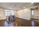 Dining area with hardwood floors, recessed lights, a window, and view of the neighborhood at 5490 Tulip Hill Ave, Las Vegas, NV 89141