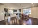 Open kitchen featuring dark cabinetry, stainless steel appliances, and breakfast nook at 5490 Tulip Hill Ave, Las Vegas, NV 89141