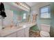 Bright bathroom with a vanity, sink, toilet, and bathtub/shower at 5767 Tabitha Ave, Las Vegas, NV 89156